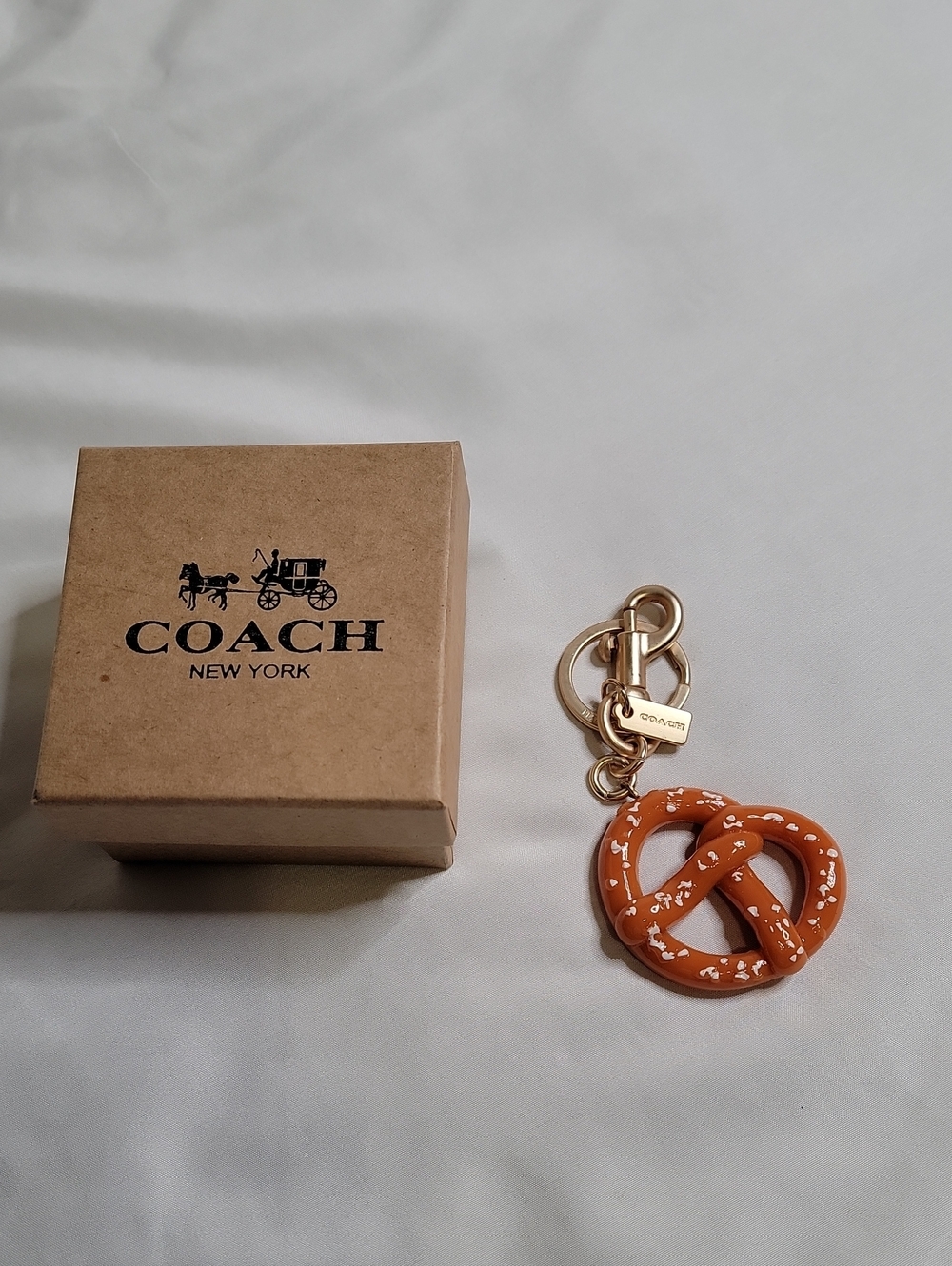 Coach Orange Pretzel Charm Key Ring with Gold Hardware